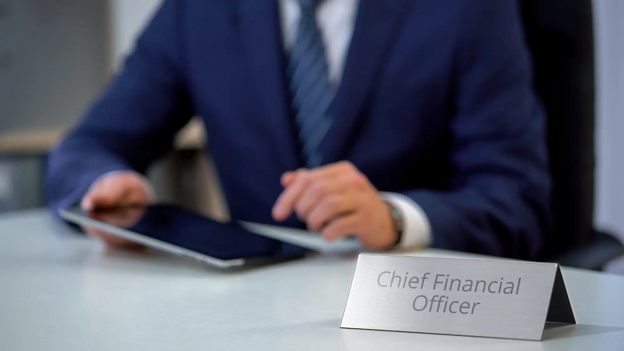 Virtual CFO advisor reviewing financial documents for a non-profit organisation