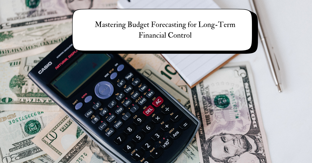 A calculator placed on top of a stack of U.S. dollar bills, next to a notebook and pen, symbolizing financial planning and budgeting.